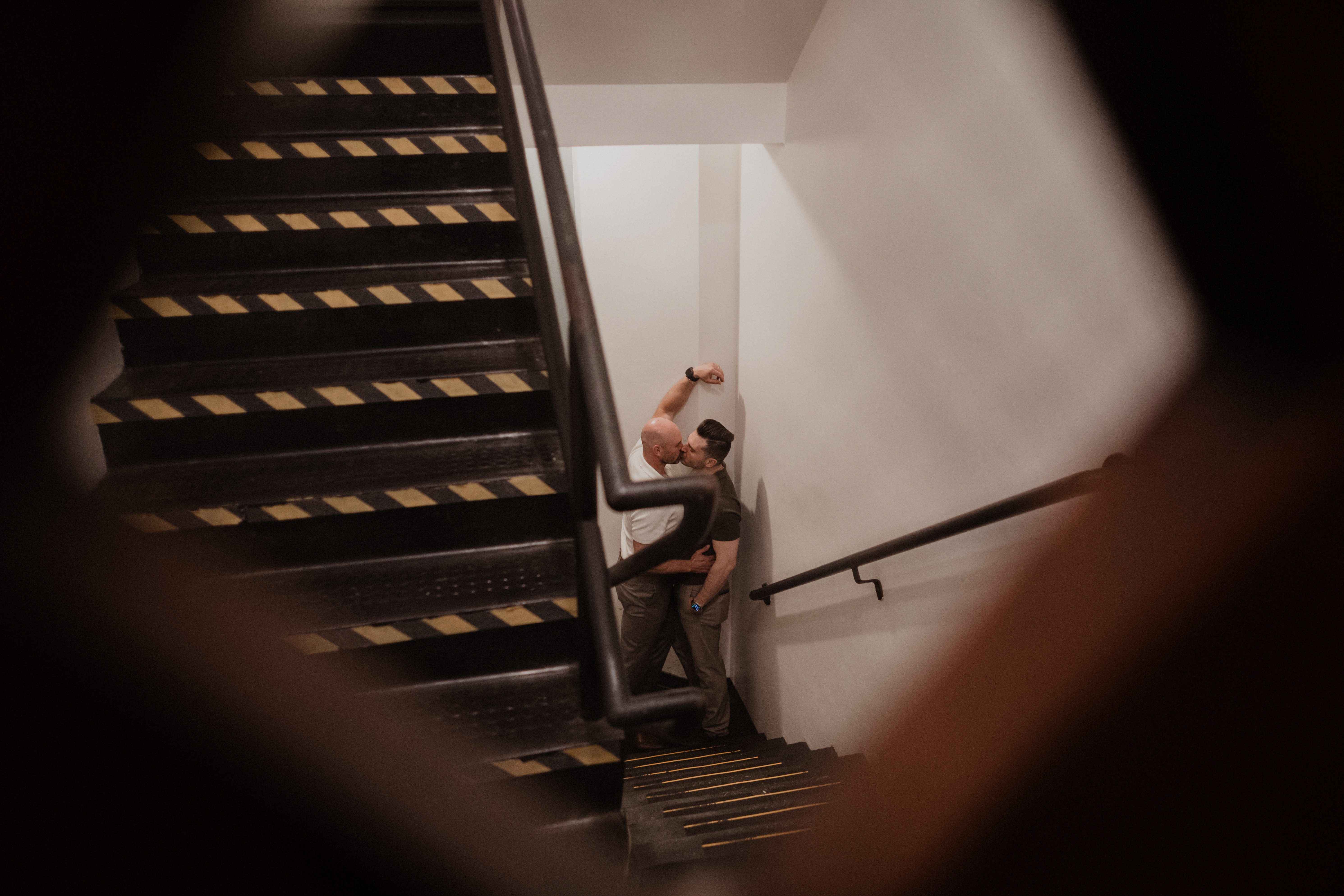 A stolen kiss in the stairwell